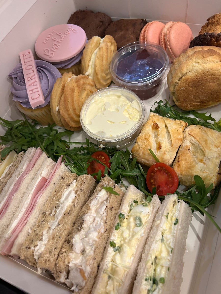 Personalised afternoon tea with named cupcakes